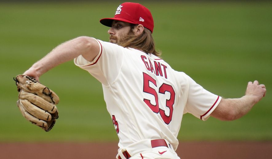 St. Louis Cardinals starting pitcher John Gant throws during the first inning of a baseball game against the Cincinnati Reds Saturday, April 24, 2021, in St. Louis. (AP Photo/Jeff Roberson)
