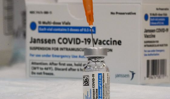 In this April 8, 2021 file photo, the Johnson &amp;amp; Johnson COVID-19 vaccine is seen at a pop-up vaccination site in the Staten Island borough of New York.  With a green light from federal health officials, several states resumed use of the one-shot Johnson &amp; Johnson coronavirus vaccine on Saturday, April 24. Among the venues where it&#39;s being deployed is the Indianapolis Motor Speedway, where free vaccinations were available to anyone 18 or older. (AP Photo/Mary Altaffer, File)  **FILE**
