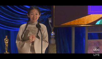 In this video image provided by ABC, Chloe Zhao accepts the award for best director for &amp;quot;Nomadland&amp;quot; at the Oscars on Sunday, April 25, 2021. (ABC via AP)