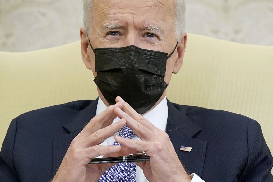 In this April 12, 2021, file photo President Joe Biden speaks during a meeting with lawmakers to discuss the American Jobs Plan in the Oval Office of the White House in Washington. (AP Photo/Patrick Semansky, File)