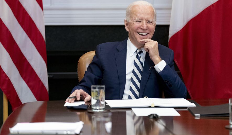 FILE - In this March 1, 2021, file photo President Joe Biden speaks during a virtual meeting with Mexican President Andres Manuel Lopez Obrador, in the Roosevelt Room of the White House in Washington. (AP Photo/Andrew Harnik, File)