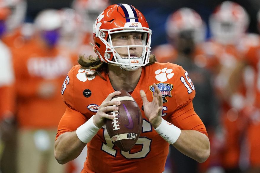 Clemson quarterback Trevor Lawrence passes against Ohio State during the first half of the Sugar Bowl NCAA college football game in New Orleans, Friday, Jan. 1, 2021. About the only certainty in the confounding 2021 NFL draft is Trevor Lawrence going to the Jaguars with the first overall pick Thursday night in Cleveland. This year&#39;s NFL draft is like none other because teams weren&#39;t able to meet face-to-face with the pool of prospects outside the lucky few who got to play in the Senior Bowl after a season that was marked by opt outs and cancellations. (AP Photo/John Bazemore, File) **FILE**