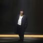 FILE - In this file photo dated Thursday, Oct. 1, 2015, Israeli fashion designer Alber Elbaz acknowledges applause at the end of his Spring-Summer 2016 ready-to-wear fashion collection for Lanvin, presented during the Paris Fashion Week, in Paris. Elbaz, best known for being at the helm of Lanvin from 2001 to 2015, has died at the age of 59, luxury conglomerate Richemont said. Fashion French daily Women’s Wear Daily said Elbaz died on Saturday, April 24, 2021 at a Paris hospital. In a statement released on Sunday, Richemont’s chairman Johann Rupert said “it was with shock and enormous sadness that I heard of Alber’s sudden passing. Alber had a richly deserved reputation as one of the industry’s brightest and most beloved figures.” (AP Photo/Thibault Camus, File)