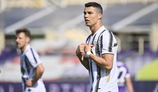 Juventus&#39; Cristiano Ronaldo reacts during a Serie A soccer match between Fiorentina and Juventus, in Florence&#39;s Artemio Franchi stadium, Italy, Sunday, April 25, 2021. (Massimo Paolone/LaPresse via AP)