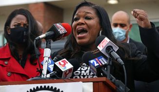 In this file photo, Rep. Cori Bush, D-St. Louis, addresses the press after touring both St. Louis jails on Saturday, April 24, 2021, outside the Medium Security Institution known as The City Workhouse. Standing to the left is St. Louis City Mayor Tishaura O. Jones. Ms. Bush and a group of other progressive House Democrats slept outside the steps of the U.S. Capitol on Friday, July 30, 2021, to protest the looming expiration of the federal eviction moratorium. (Laurie Skrivan/St. Louis Post-Dispatch via AP)  **FILE**