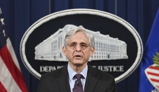 Attorney General Merrick Garland speaks at the Department of Justice in Washington, Monday, April 26, 2021. The Justice Department is opening a sweeping probe into policing in Louisville after the March 2020 death of Breonna Taylor, who was shot to death by police during a raid at her home. (Mandel Ngan/Pool via AP)