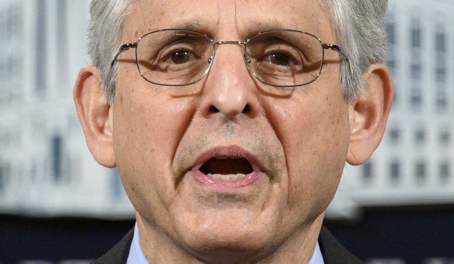 Attorney General Merrick Garland speaks at the Department of Justice in Washington, Monday, April 26, 2021. The Justice Department is opening a sweeping probe into policing in Louisville after the March 2020 death of Breonna Taylor, who was shot to death by police during a raid at her home.  (Mandel Ngan/Pool via AP)