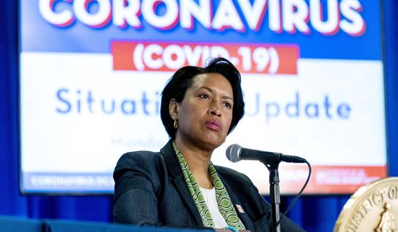 In this March 15, 2021, file photo, Washington Mayor Muriel Bowser takes a question during a coronavirus update at a news conference in Washington. (AP Photo/Andrew Harnik) ** FILE **