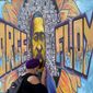 Damarra Atkins paid her respects to George Floyd at a mural at George Floyd Square, Friday, April 23, 2021, in Minneapolis. (AP Photo/Julio Cortez)