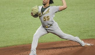 Oakland Athletics starter Sean Manaea pitches against the Tampa Bay Rays during the first inning of a baseball game Monday, April 26, 2021, in St. Petersburg, Fla. (AP Photo/Steve Nesius)