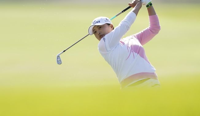 Jin Young Ko hits from the 15th fairway during the final round of the LPGA&#x27;s Hugel-Air Premia LA Open golf tournament at Wilshire Country Club Saturday, April 24, 2021, in Los Angeles. (AP Photo/Ashley Landis)