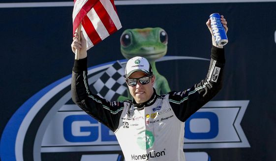 Brad Keselowski (2) celebrates after winning the Geico 500 NASCAR Sprint Cup auto race at Talladega Superspeedway, Sunday, April 25, 2021, in Talladega, Ala. (AP Photo/Butch Dill)