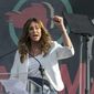 FILE - In this Jan. 18, 2020, file photo, Caitlyn Jenner speaks at the 4th Women&#39;s March in Los Angeles. In her four days as a candidate for California governor, Jenner had a twitter spat with a Democratic congressman, unveiled a website to sell campaign coffee mugs and swag and was photographed with a startup business owner. (AP Photo/Damian Dovarganes, File)