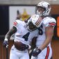 Auburn running back Tank Bigsby (4) celebrates a touchdown with teammate Luke Deal (86) during the A-Day spring football game Saturday, April 17, 2021, at Jordan-Hare Stadium in Auburn, Ala. (AP Photo/Julie Bennett)