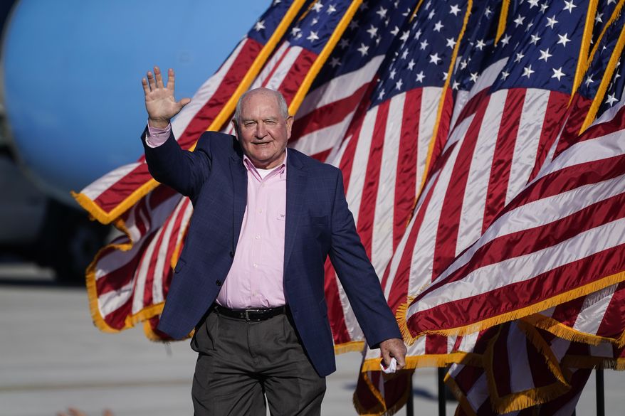 FILE - In this Dec. 10, 2020 file photo, then Agriculture Secretary Sonny Perdue arrives at a campaign rally in Augusta, Ga. A college accrediting agency is asking whether there is undue political pressure on the regents who oversee Georgia’s 26 public universities and colleges to name Perdue as the system’s chancellor. (AP Photo/John Bazemore, File)