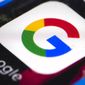 This April 26, 2017 file photo shows the Google mobile phone icon, in Philadelphia. Alphabet Inc., parent company of Google, reports financial results, Tuesday, April 27, 2021. Google’s digital advertising network has shifted back into high gear after an unprecedented reversal during the early stages of the pandemic. (AP Photo/Matt Rourke)
