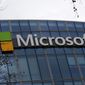 This Jan. 8, 2021 file photo shows the logo of Microsoft displayed outside the headquarters in Paris. (AP Photo/Thibault Camus, file)