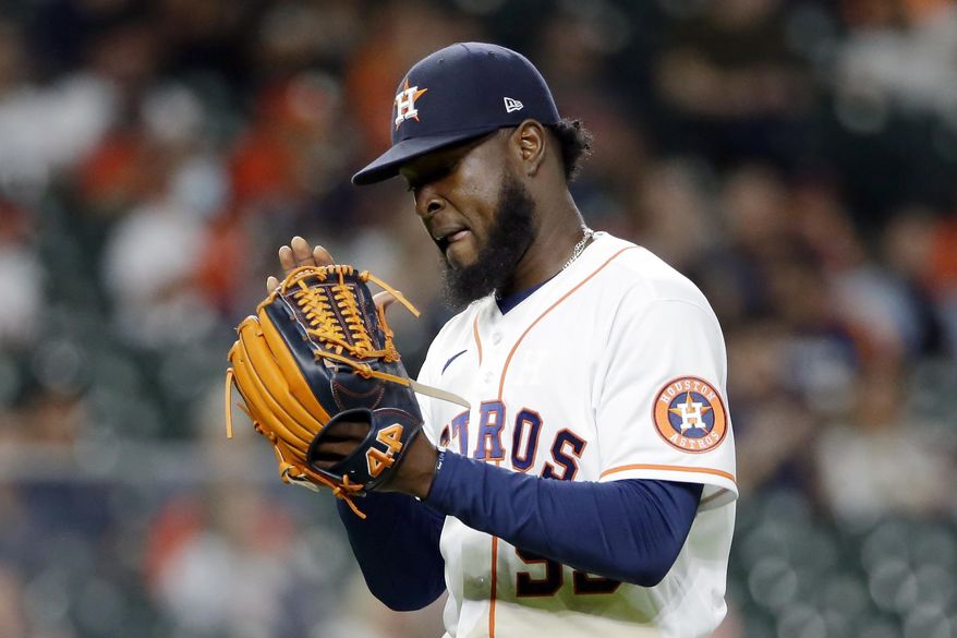 Houston Astros starting pitcher Cristian Javier reacts as he leaves the mound after striking out Seattle Mariners&#39; Sam Haggerty during the seventh inning of a baseball game Tuesday, April 27, 2021, in Houston. (AP Photo/Michael Wyke)