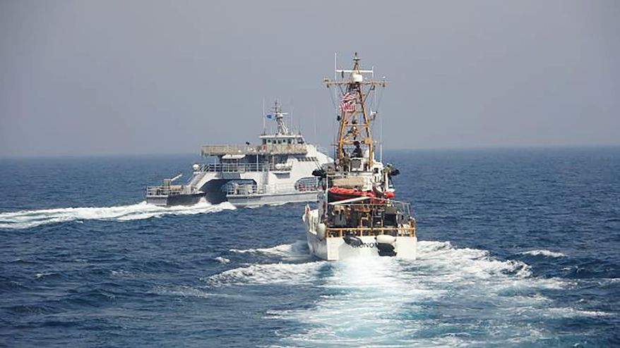 In an April 2, 2021, photo released by the U.S. Navy, an Iranian Revolutionary Guard vessel cut in front of the U.S. Coast Guard ship USCGC Monomoy in the Persian Gulf. American and Iranian warships had a tense encounter in the Persian Gulf earlier this month, the first such incident in about a year amid wider turmoil in the region over Tehran's tattered nuclear deal, the U.S. Navy said Tuesday, April 27, 2021. (U.S. Navy via AP) ** FILE **