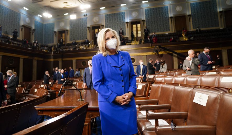 Rep. Liz Cheney, R-Wyo., arrives to the chamber ahead of President Joe Biden speaking to a joint session of Congress, Wednesday, April 28, 2021, in the House Chamber at the U.S. Capitol in Washington. (Melina Mara/The Washington Post via AP, Pool) ** FILE **