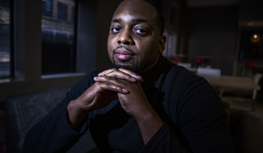 Brandon Mitchell, a juror in the trial of former Minneapolis police Officer Derek Chauvin for the killing of George Floyd, poses for a picture, Wednesday April 28, 2021, in Minneapolis. (Richard Tsong-Taatarii/Star Tribune via AP)