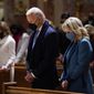 In this Wednesday, Jan. 20, 2021, photo, President-elect Joe Biden and his wife, Jill Biden, attend Mass at the Cathedral of St. Matthew the Apostle during Inauguration Day ceremonies in Washington. When U.S. Catholic bishops hold their next national meeting in June 2021, they’ll be deciding whether to send a tougher-than-ever message to President Joe Biden and other Catholic politicians: Don’t partake of Communion if you persist in public advocacy of abortion rights. (AP Photo/Evan Vucci) **FILE**