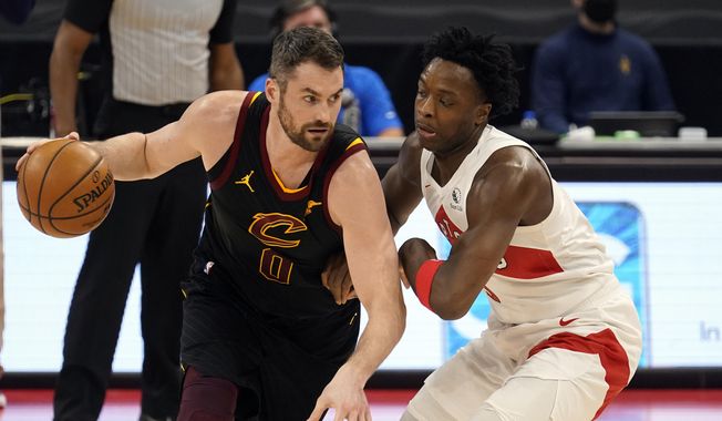 Cleveland Cavaliers forward Kevin Love (0) drives around Toronto Raptors forward OG Anunoby (3) during the first half of an NBA basketball game Monday, April 26, 2021, in Tampa, Fla. (AP Photo/Chris O&#x27;Meara) **FILE**