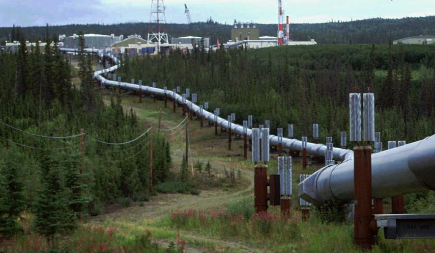 In this undated file photo the Trans-Alaska pipeline and pump station north of Fairbanks, Alaska is shown. Congressional Democrats are moving to reinstate regulations designed to limit potent greenhouse gas emissions from oil and gas fields. It&#39;s part of a broader effort by the Biden administration to combat climate change.(AP Photo/Al Grillo) **FILE**
