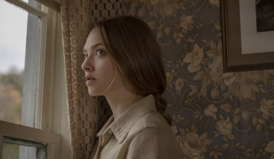 This image released by Netflix shows Amanda Seyfried in a scene from "Things Heard And Seen." (Anna Kooris/Netflix via AP)