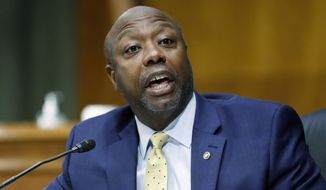 In this May 7, 2020, photo, Sen. Tim Scott, R-S.C., speaks during a Senate Health Education Labor and Pensions Committee hearing on new coronavirus tests on Capitol Hill in Washington. (AP Photo/Andrew Harnik, Pool) **FILE**