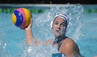 FILE - In this  Sunday, May 22, 2016 file photo, United States attacker Kiley Neushul passes the ball during a women&#39;s exhibition water polo match against Australia in Los Angeles. Kiley Neushul had a plan. She was going to play for the U.S. women&#39;s water polo team in the Tokyo Olympics, and then move to Italy. Then the games were postponed because of the COVID-19 pandemic, and Neushul — one of the best players in the world — had to make a decision. She chose the rest of her life. (AP Photo/Mark J. Terrill, File)