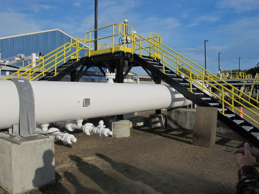 This photo taken in October 2016 shows an aboveground section of Enbridge&#x27;s Line 5 at the Mackinaw City, Mich., pump station. Michigan Gov. Gretchen Whitmer has ordered the pipeline shut down because of concerns about a potential spill in the channel that connects Lake Huron and Lake Michigan. Enbridge is resisting the order with the support of Canadian officials who say Line 5 is essential to their economy. (AP Photo/John Flesher) **FILE**