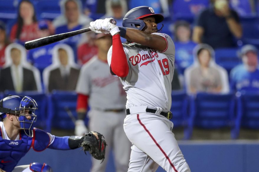 Washington Nationals&#39; Josh Bell follows through on a two-run home run against the Toronto Blue Jays during the fifth inning of a baseball game Wednesday, April 28, 2021, in Dunedin, Fla. (AP Photo/Mike Carlson) **FILE**