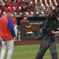 Philadelphia Phillies manager Joe Girardi, left, is ejected by umpire Chris Segal during the sixth inning of the team&#39;s baseball game against the St. Louis Cardinals on Wednesday, April 28, 2021, in St. Louis. (AP Photo/Joe Puetz)