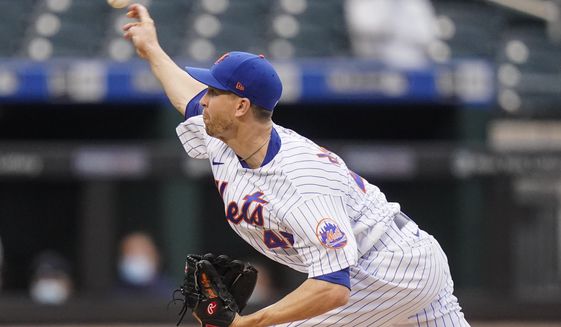 New York Mets&#39; Jacob deGrom delivers a pitch during the first inning of a baseball game against the Boston Red Sox Wednesday, April 28, 2021, in New York. (AP Photo/Frank Franklin II)