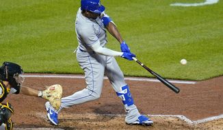 Kansas City Royals&#39; Jorge Soler drives in a run with a single off Pittsburgh Pirates pitcher Sean Poppen during the fourth inning of a baseball game in Pittsburgh, Wednesday, April 28, 2021. (AP Photo/Gene J. Puskar)