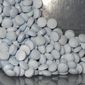 This undated file photo provided by the U.S. Attorney&#x27;s Office for Utah and introduced as evidence at a trial shows fentanyl-laced fake oxycodone pills collected during an investigation.  (U.S. Attorneys Office for Utah via AP, File)