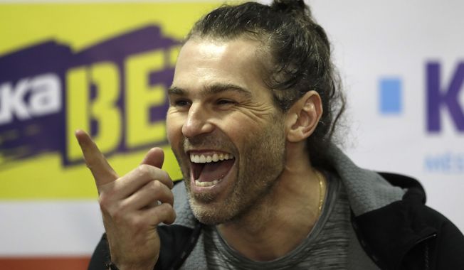 In this Thursday, Feb. 1, 2018, file photo, Jaromir Jagr smiles during a press conference at the Kladno Knights hockey club in Kladno, Czech Republic. Jaromir Jagr is ageless. On Thursday April 29, 2021, the 49-year-old had an assist on the way to his Kladno Knights&#x27;s 5-2 victory over Jihlava to clinch their playoff series 4-3 and qualify for the top Czech league in next season. (AP Photo/Petr David Josek/ File) **FILE**
