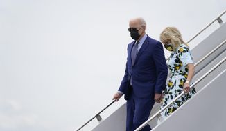 President Joe Biden and first lady Jill Biden exits Air Force One as they arrive at Lawson Army Airfield during a trip to mark his 100th day in office, Thursday, April 29, 2021, in Fort Benning, Ga. (AP Photo/Evan Vucci)