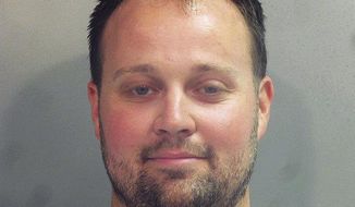 This photo provided by the Washington County (Ark.) Jail shows Joshua Duggar. Former reality TV Star Josh Duggar is being held in a northwest Arkansas jail after being arrested, Thursday, April 29, 2021 by federal authorities, but it’s unclear what charges he may face.  (Washington County Arkansas Jail via AP)