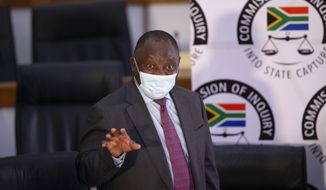 South African President Cyril Ramaphosa appears on behalf of the ruling African National Congress party at the Zondo Commission of Inquiry into state corruption in Johannesburg, South Africa, Thursday, April 29, 2021. Ramaphosa says rampant corruption has seriously damaged South Africa’s economy and people’s trust in the government. (Kim Ludbrook/Pool via AP)