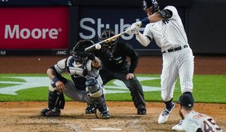 New York Yankees&#39; Aaron Judge hits a grand slam during the fourth inning of a baseball game against the Detroit Tigers, Friday, April 30, 2021, in New York. (AP Photo/Frank Franklin II)