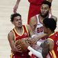 Atlanta Hawks guard Trae Young, left, and John Collins (20) battle Chicago Bulls guard Denzel Valentine (45) in the second half of an NBA basketball game Saturday, May 1, 2021, in Atlanta. (AP Photo/John Bazemore)