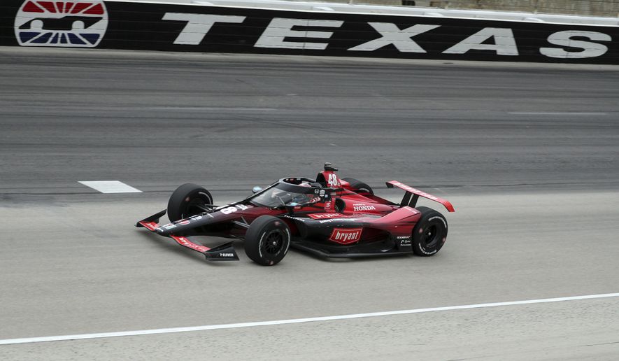 Tony Kanaan drives out of Turn 4 during the IndyCar Series auto race at Texas Motor Speedway on Saturday, May 1, 2021, in Fort Worth, Texas. (AP Photo/Richard W. Rodriguez)