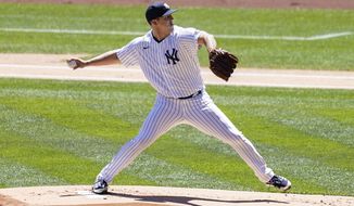 New York Yankees starting pitcher Jameson Taillon (50) throws in the first inning of a baseball game against the Detroit Tigers, Saturday, May 1, 2021, in New York. (AP Photo/John Minchillo)
