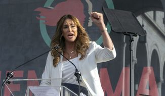 In this Jan. 18, 2020, file photo, Caitlyn Jenner speaks at the 4th Women&#39;s March in Los Angeles. Former Olympian Jenner is running for governor of California.(AP Photo/Damian Dovarganes, File)