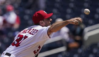 Washington Nationals starting pitcher Max Scherzer throws during the third inning of a baseball game against the Miami Marlins at Nationals Park, Sunday, May 2, 2021, in Washington. (AP Photo/Alex Brandon)