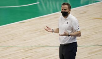 Washington Wizards head coach Scott Brooks gestures as his team plays the Dallas Mavericks during the second half of an NBA basketball game Saturday, May 1, 2021, in Dallas. (AP Photo/Ron Jenkins)