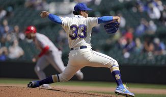 Seattle Mariners starting pitcher Justus Sheffield throws against the Los Angeles Angels during the sixth inning of a baseball game, Sunday, May 2, 2021, in Seattle. (AP Photo/Ted S. Warren)