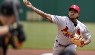 St. Louis Cardinals starting pitcher Carlos Martinez delivers during the first inning of a baseball game against the Pittsburgh Pirates in Pittsburgh, Sunday, May 2, 2021.(AP Photo/Gene J. Puskar)